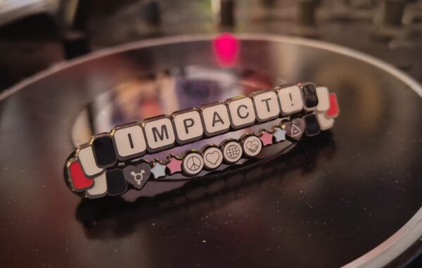 impact enamel pin picture front